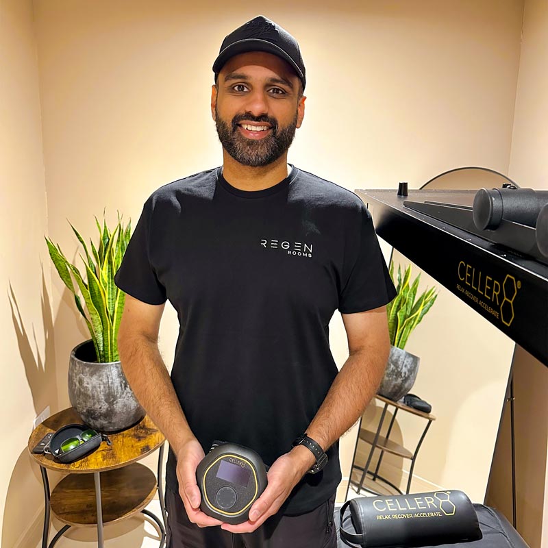 Owner of ReGen Room holding the CELLER8 in his clinic