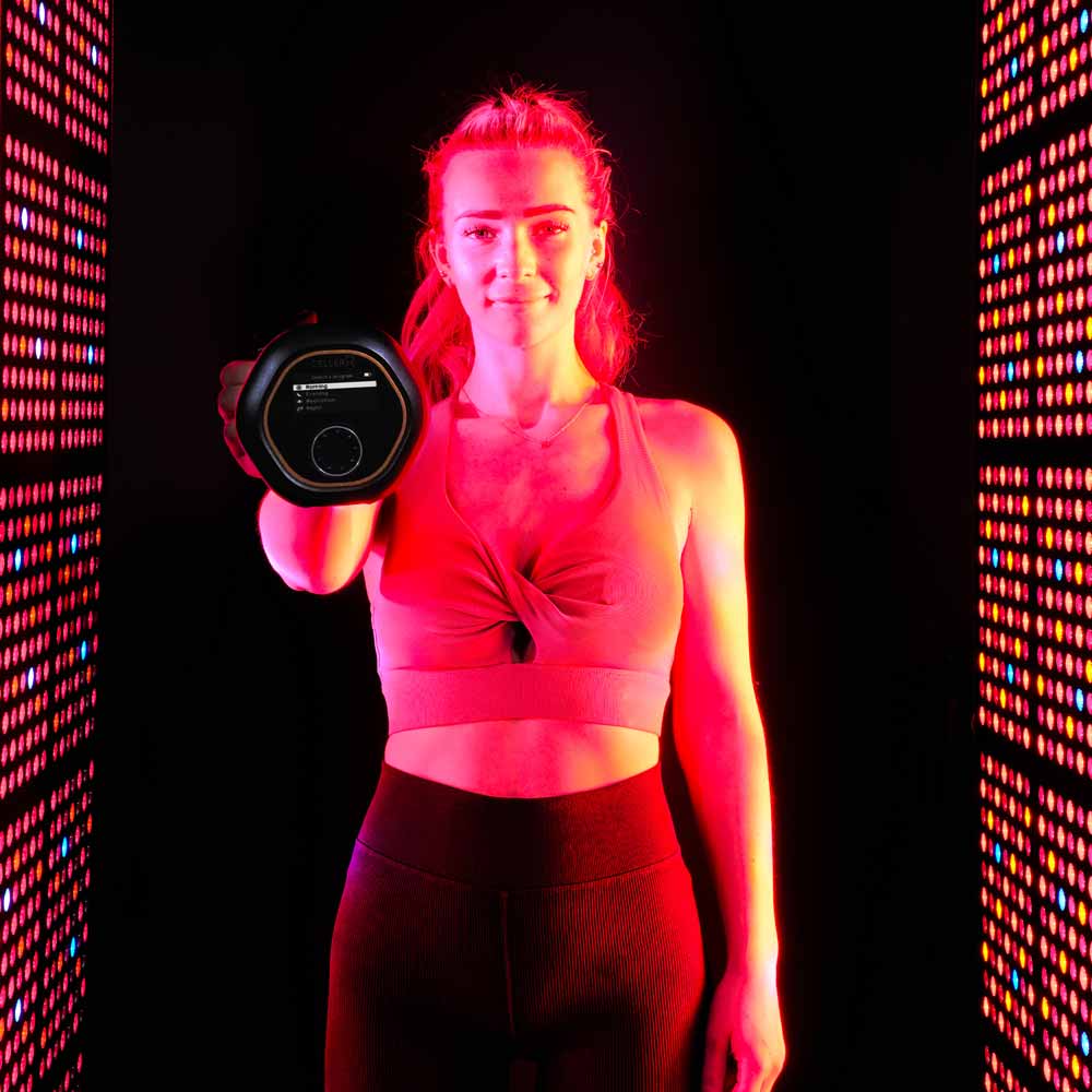 Sitting on travel mat on sofa while having CELLER8 applied to arm