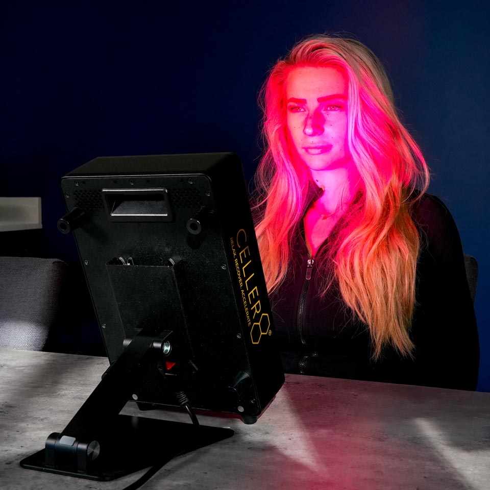Women sat in front desktop red light at dinning table