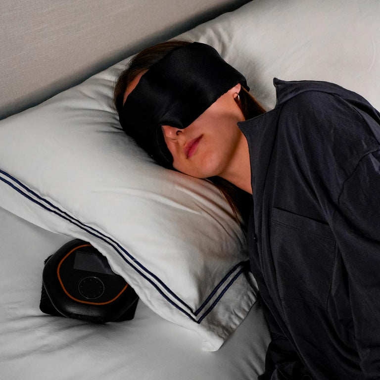 Women using CELLER8 on night mode under pillow 