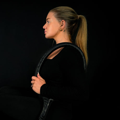 Women with large loop around shoulder