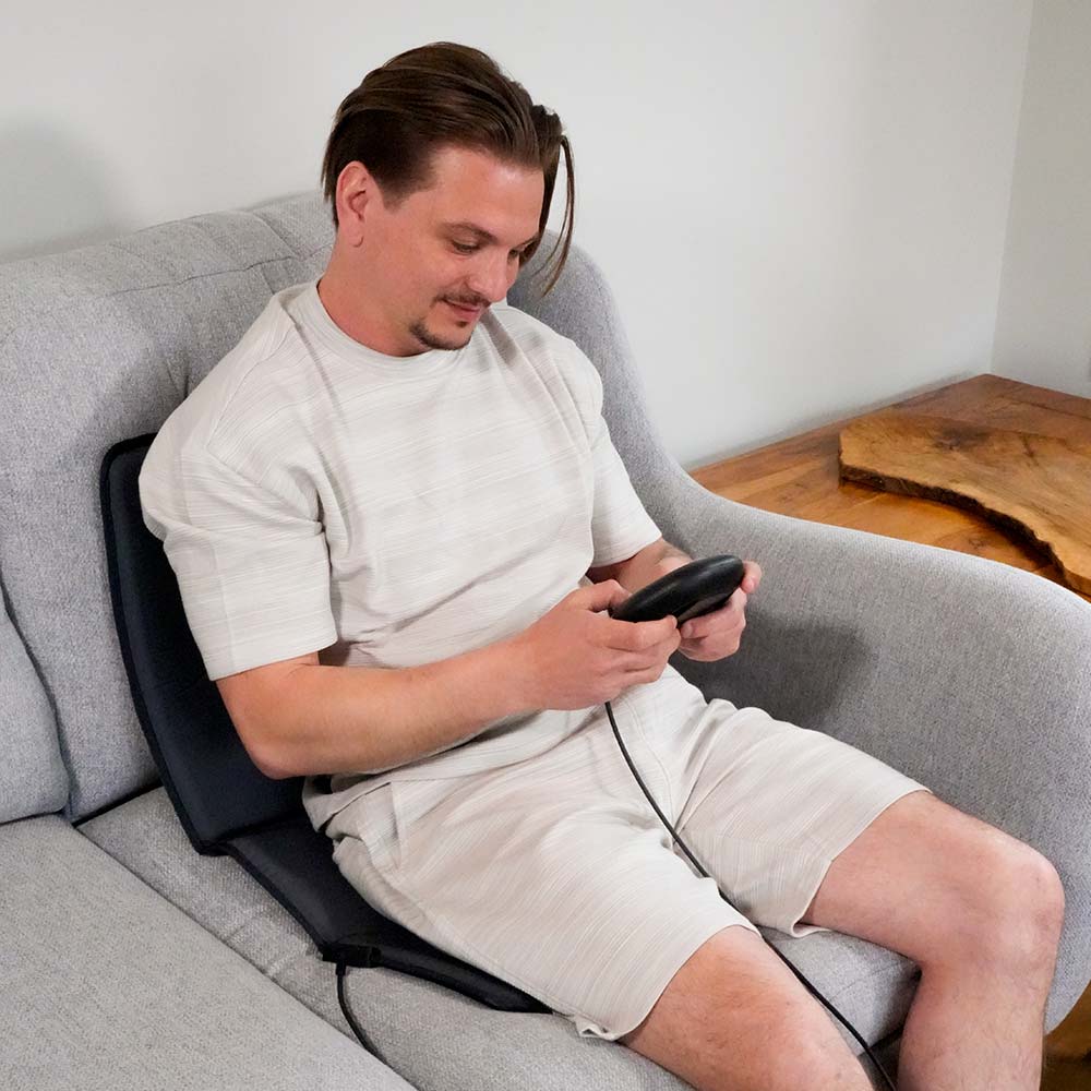 Sat on sofa setting up CELLER8 for a session on the travel mat