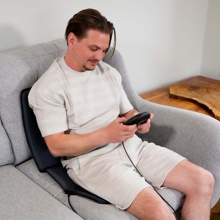 Sat on sofa setting up CELLER8 for a session on the travel mat