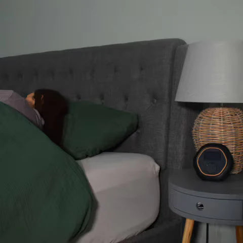 Lady laying in bed next to CELLER8