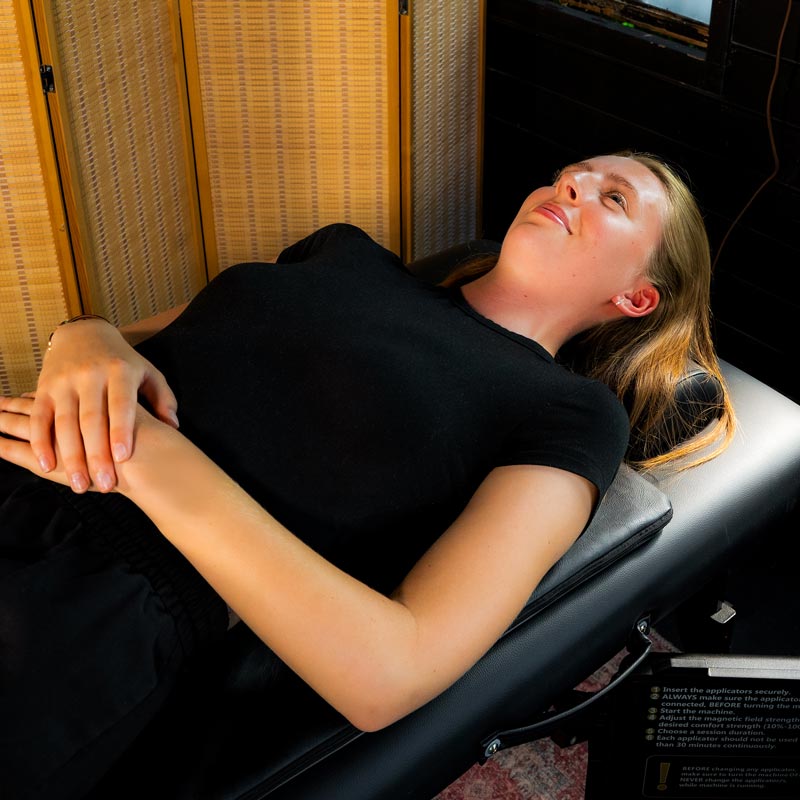 Women laying on CELLER8 Max full body mat