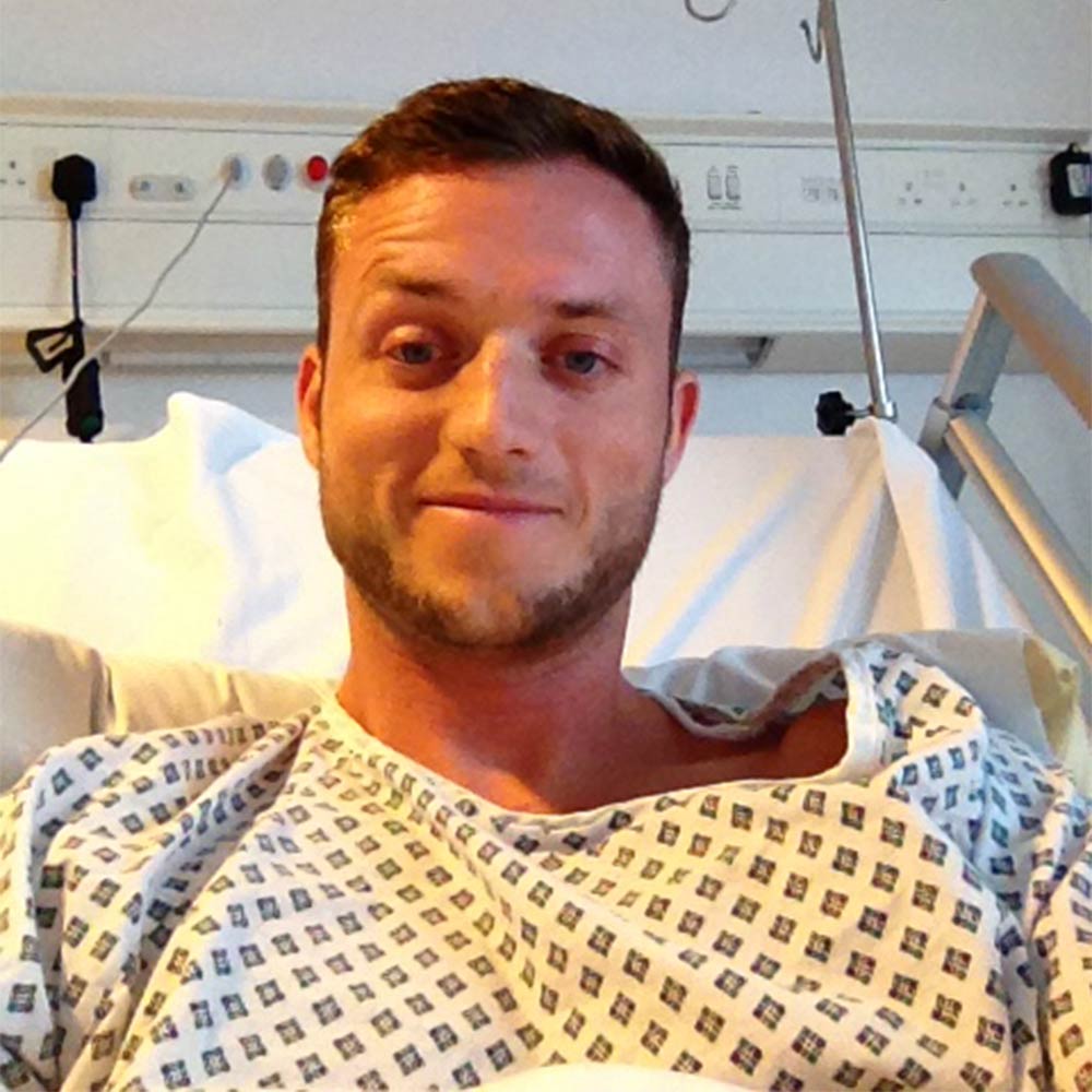 Andy in hospital bed